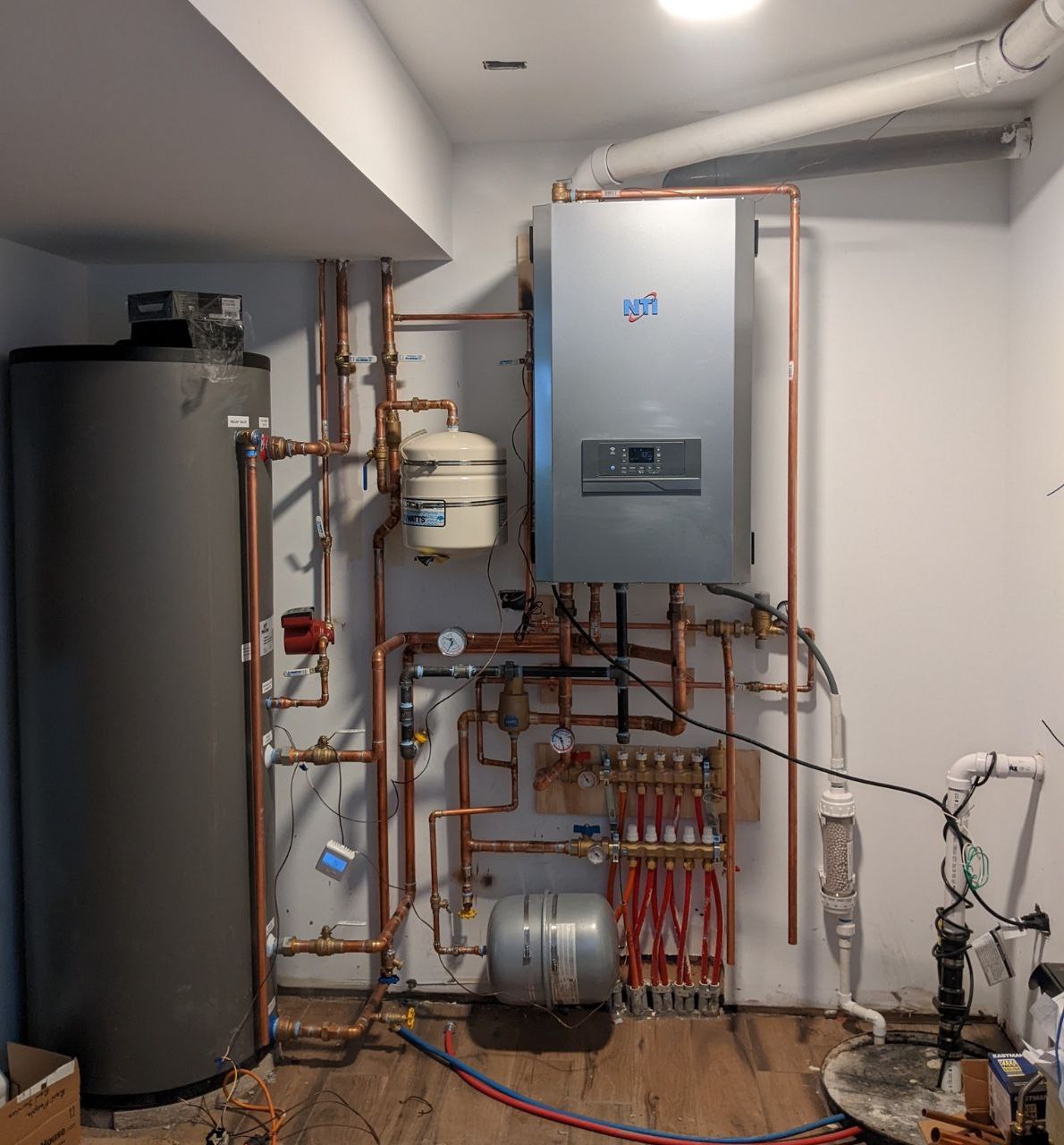 Heated floor installation access service area